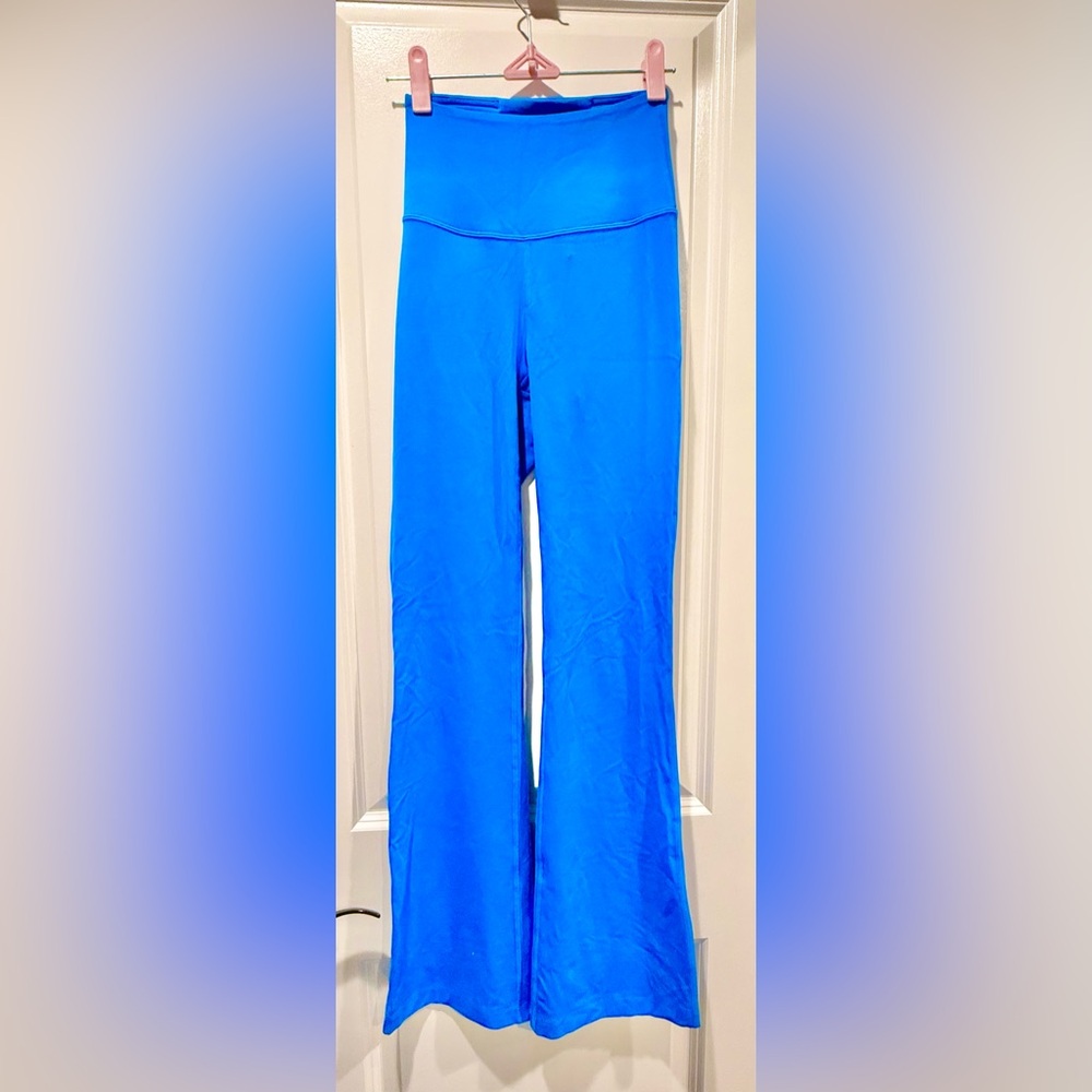 NWOT. Lululemon 👖 Neon blue high waisted flare pant. NEVER WORN. Size 2. 💙
